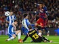 Barcelona's Neymar competes for the ball with Espanyol players during the Copa del Rey round-of-16 first leg at Camp Nou on January 6, 2016
