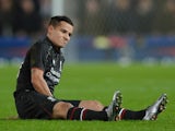 Philippe Coutinho sits injured during the League Cup semi-final between Stoke and Liverpool on January 5, 2016