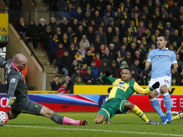 Sergio Aguero scores Manchester City's first goal during the FA Cup third-round match against Norwich City on January 9, 2016