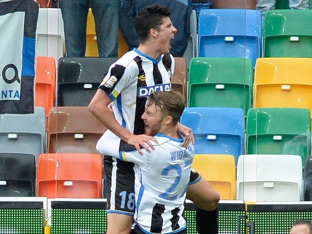 Stipe Perica and Silvan Widmer in action during the game between Udinese and Atalanta on January 6, 2016