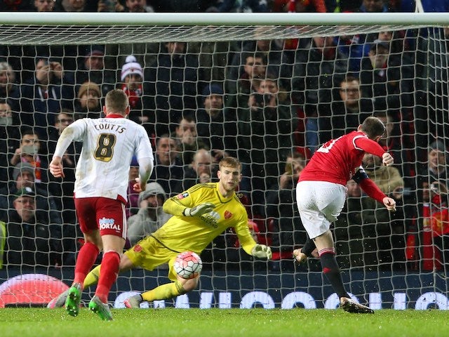 Wayne Rooney scores a penalty during the FA Cup game between Manchester United and Sheffield United on January 9, 2016