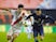 Rayo Vallecano's Zhang Chengdong vies with Atletico Madrid's Yannick Ferreira Carrasco on January 6, 2016