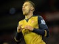 Aaron Ramsey celebrates scoring during the game between Liverpool and Arsenal on January 13, 2016