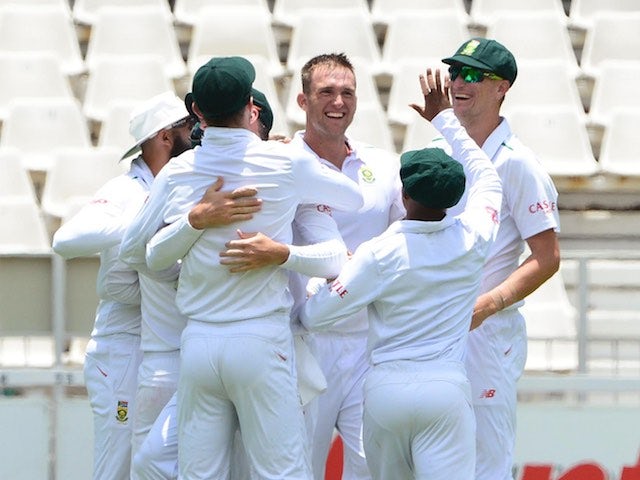 South Africa celebrate the wicket of Alastair Cook on day two of the third Test between South Africa and England on January 15, 2016