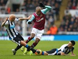 Angelo Ogbonna Obinza of West Ham United competes for the ball against Jonjo Shelvey and Aleksandar Mitrovic of Newcastle United at St James' Park on January 16, 2016