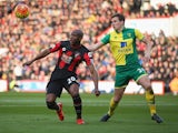  Benik Afobe of Bournemouth and Ryan Bennett of Norwich City compete for the ball on January 16, 2016