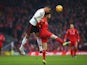 Chris Smalling of Manchester United wins a header from Adam Lallana of Liverpool on January 17, 2016