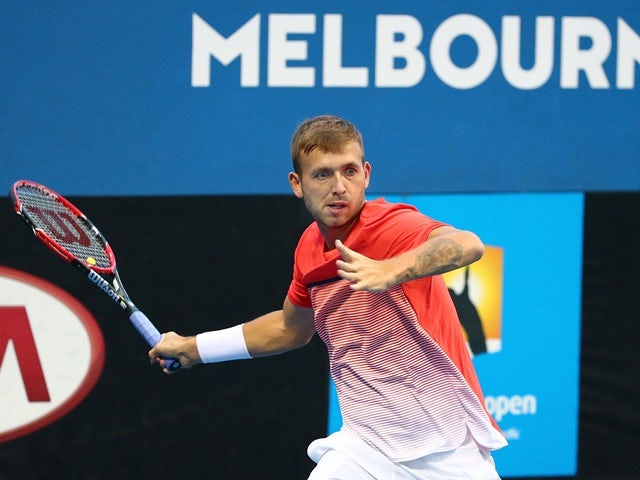 Dan Evans plays a forehand in his match against Amir Weintraub during the second round of 2016 Australian Open Qualifying at Melbourne Park on January 14, 2016