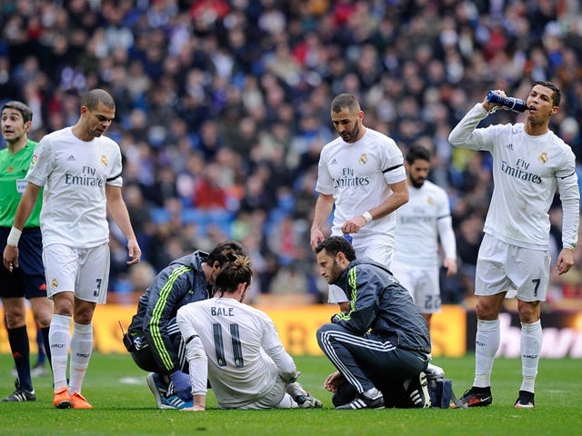 Gareth Bale of Real Madrid lies injured during the La Liga match against Sporting Gijon on January 17, 2016