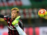 Keisuke Honda in action with Kenny Everett during the game between Milan and Fiorentina on January 17, 2016