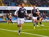 Lee Gregory celebrates scoring the first goal of the League One match between Millwall and Port Vale on January 17, 2016