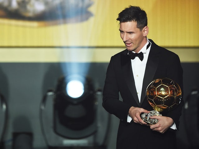Lionel Messi receives the Ballon d'Or during the FIFA Ballon d'Or Gala 2015 at the Kongresshaus on January 11, 2016