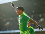 Patrick van Aanholt celebrates during the game between Spurs and Sunderland on January 16, 2016