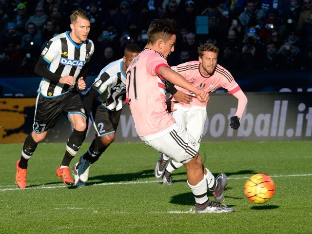 Paulo Dybala of Juventus FC scores his team's third goal from the penalty spot on January 17, 2016