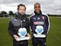 Quique Sanchez Flores and Odion Ighalo with their Manager and Player of the Month awards for December 2015