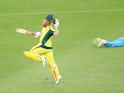 Aaron Finch of Australia celebrates scoring a century against India on January 20, 2016