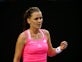Agnieszka Radwanska keeps semi-finals hopes alive with win at WTA Finals