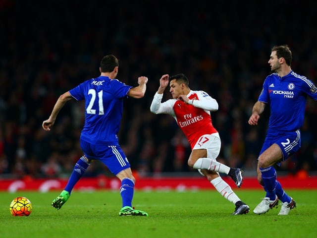 Alexis Sanchez of Arsenal is fouled by Nemanja Matic of Chelsea  on January 24, 2016 