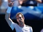 Andy Murray sticks a thumb up on day two of the Australian Open on January 19, 2016