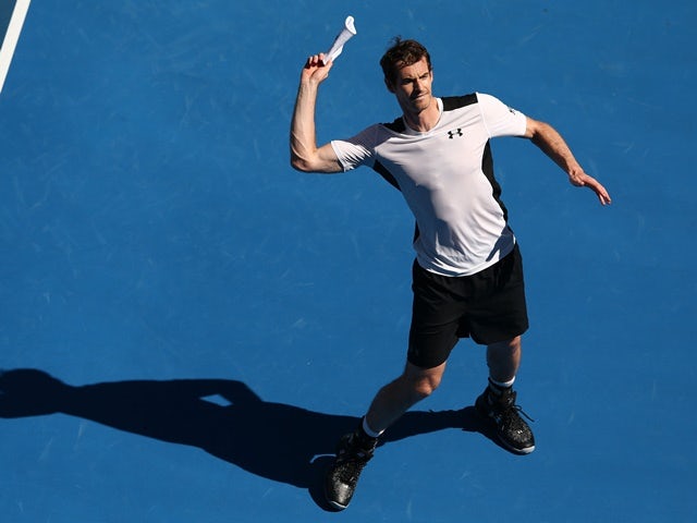 Andy Murray celebrates match point in his second-round match against Sam Groth during day four of the 2016 Australian Open  on January 21, 2016