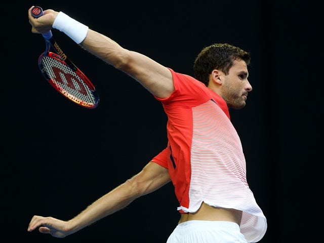 Grigor Dimitrov in action against Roger Federer during day five of the 2016 Australian Open at Melbourne Park on January 22, 2016