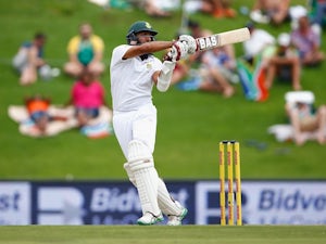 South Africa lose four wickets on rain-hit day