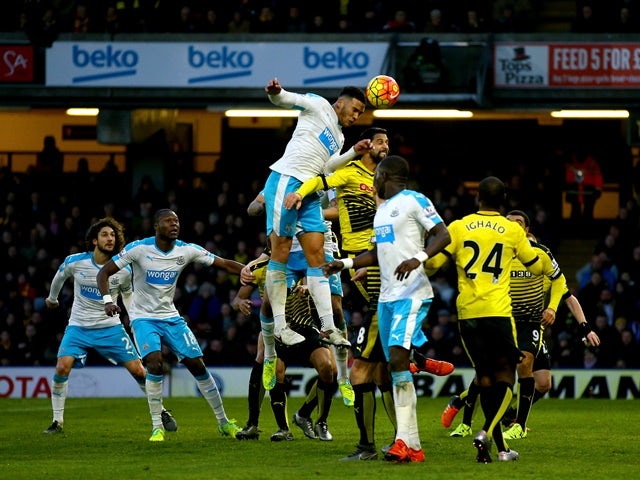 Jamaal Lascelles of Newcastle United heads the ball to score his team's first goal against Watford at Vicarage Road on January 23, 2016