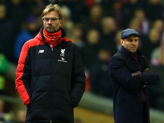 Managers Jurgen Klopp of Liverpool and Paul Tisdale of Exeter City at Anfield on January 20, 2016