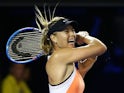 Maria Sharapova of Russia plays a forehand in her second-round match against Aliaksandra Sasnovich of Belarus during day three of the 2016 Australian Open  on January 20, 2016