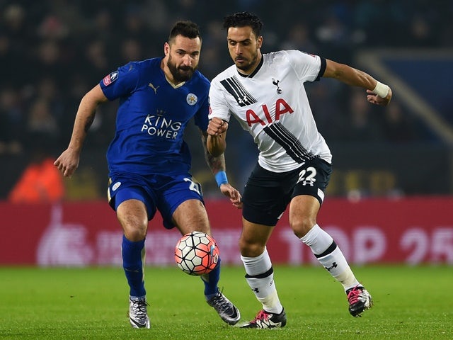 Nacer Chadli of Tottenham Hotspur is challenged by Marcin Wasilewski of Leicester City on January 20, 2016