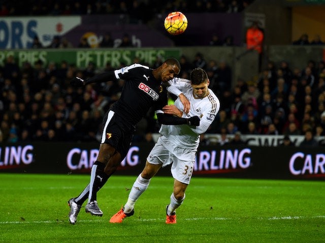 Odion Ighalo and Federico Fernandez in action during the game between Swansea and Watford on January 18, 2016