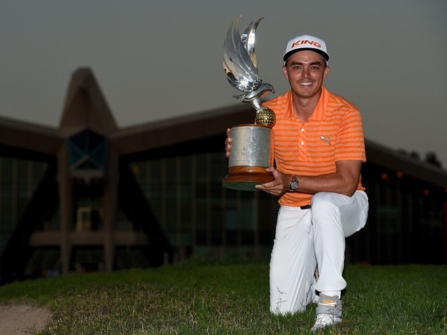 Rickie Fowler with the winners trophy after the final round of the Abu Dhabi HSBC Golf Championship on January 24, 2016