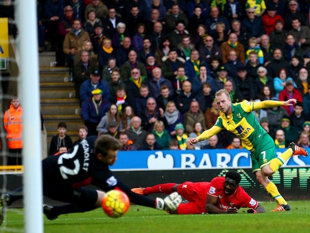 Norwich City's Steven Naismith scores against Liverpool in the Premier League on January 23, 2016