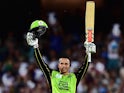 Usman Khawaja of the Sydney Thunder reacts after reaching his century during the Big Bash League semi-final against the Adelaide Strikers on January 21, 2016