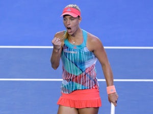 Defending champion Kerber into round two