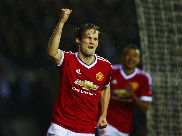 Daley Blind celebrates as he scores during the FA Cup fourth-round match between Derby County and Manchester United at iPro Stadium on January 29, 2016