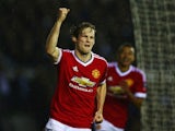 Daley Blind celebrates as he scores during the FA Cup fourth-round match between Derby County and Manchester United at iPro Stadium on January 29, 2016
