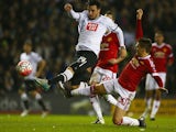 George Thorne beats Guilermo Varela to score during the Emirates FA Cup fourth-round match between Derby County and Manchester United at iPro Stadium on January 29, 2016