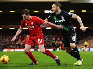 Flanagan keen to regain place at Liverpool