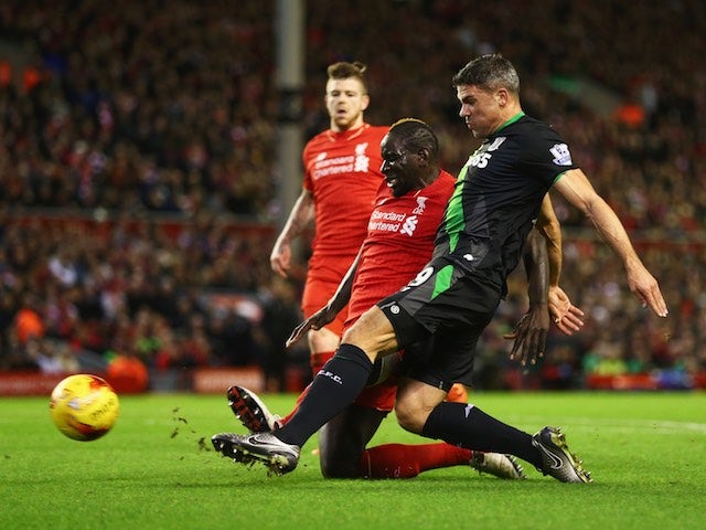 Jonathan Walters and Mamadou Sakho in action during the League Cup match between Liverpool and Stoke City on January 26, 2016