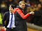 Jurgen Klopp of Liverpool signals as Slaven Bilic of West Ham United doesn't during the FA Cup fourth-round match on January 30, 2016
