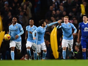 Man City overturn deficit to reach final