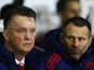 Louis van Gaal and Ryan Giggs look on prior to during the FA Cup fourth-round match between Derby County and Manchester United at iPro Stadium on January 29, 2016