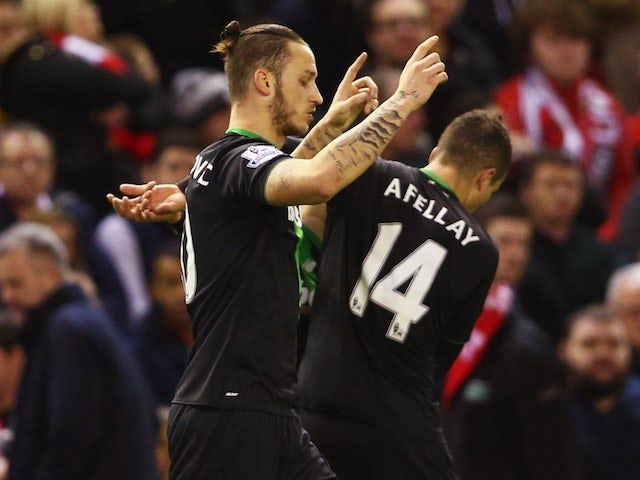 Marko Arnautovic celebrates scoring during the League Cup match between Liverpool and Stoke City on January 26, 2016