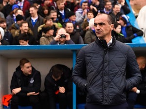 Martinez: 'Duo hurt by racist abuse'