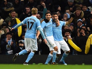 Sergio Aguero celebrates scoring the winner during the League Cup game between Manchester City and Everton on January 27, 2016