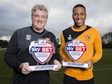 Hull City's Abel Hernandez and big bloody Steve Bruce pose with their player and manager of the month awards for January 2016