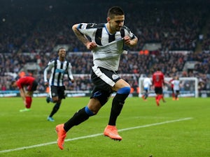 Aleksandar Mitrovic shows off a white vest after scoring during the Premier League game between Newcastle United and West Bromwich Albion on February 6, 2016