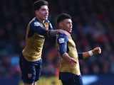 Alex Oxlade-Chamberlain is rewarded by Hector Bellerin during the Premier League game between Bournemouth and Arsenal on February 7, 2016