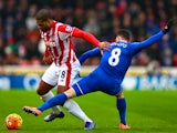 Glen Johnson and Bryan Oviedo compete for the ball during the Premier League match between Stoke City and Everton at Britannia Stadium on February 6, 2016